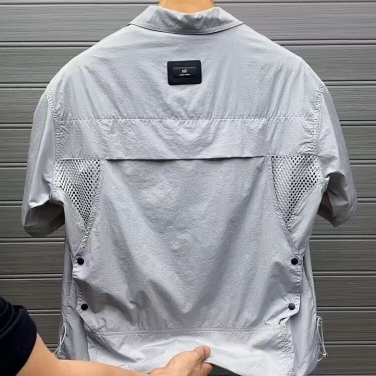 Workwear Style Lapel Short-Sleeved Shirt for Men, New Summer Style with Large Pockets, Breathable, Versatile, Ice Silk, Quick-Drying, Sun-Protective Jacket Workwear Style Lapel Short-Sleeved Shirt for Men, New Summer Style with Large Pockets, Breathable, Versatile, Ice Silk, Quick-Drying, Sun-Protective Jacket