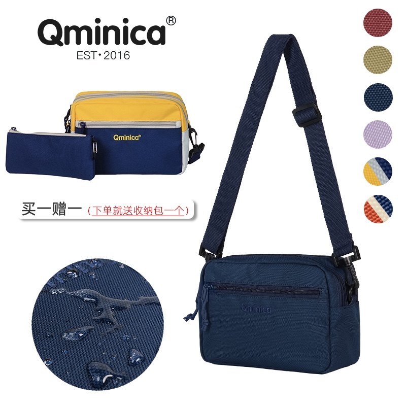 Qminica official website Time series Lightweight and multifunctional hand to collect mommy bag out to take the bag