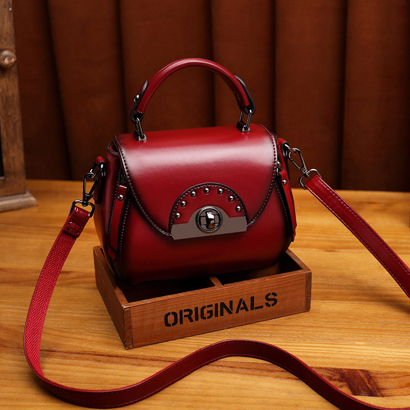 Genuine leather packets bag women 2022 Summer new wave Advanced texture retro hand single shoulder inclined satchel 100 hitch