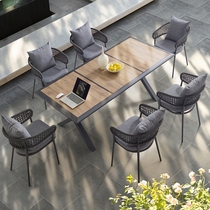 Nordic outdoor teak rattan choreography with upscale long table and chairs Courtyard Open-air Villa garden Yangguang Room Leisure Hotel Brief