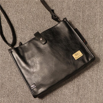 Hong Kong mens bag Retro school bag trendy shoulder bag Business casual messenger bag Mens and womens leather bag iPad bag