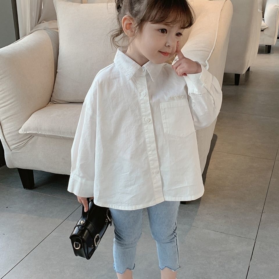 2021 girls' spring clothes new white letters Korean version long-sleeved shirt baby foreign style child solid color shirt top