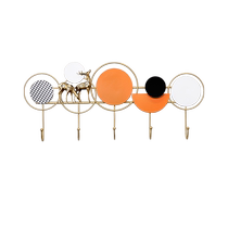 Creative wall hook behind the door entrance coat hook punch-free Internet celebrity light luxury entrance metal coat hook storage rack