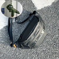 Улучшенная магнитная пряжка с изображением динозавра черного и зеленого цвета.