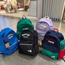 TNF 2024 childrens schoolbag boys and girls primary school students first to third grade ultra-light weight-reducing spine protection backpack