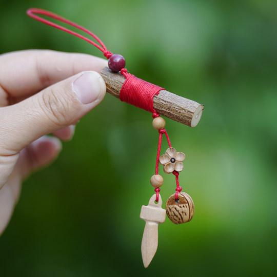 Mahogany core Southeast stick pendant for babies and pregnant women