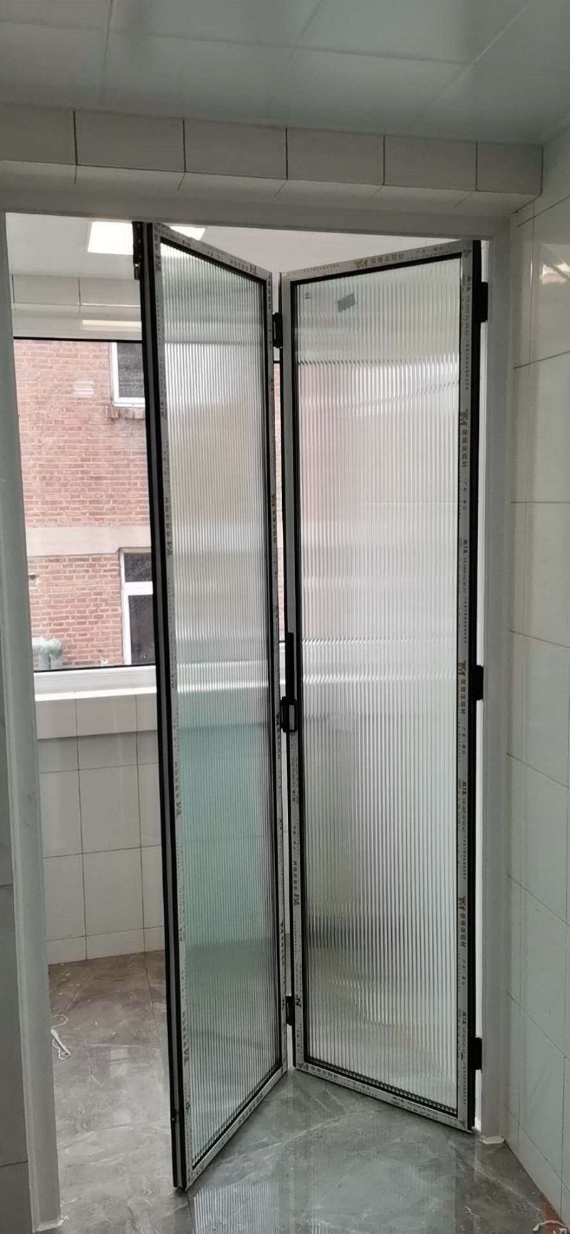 East China Evergrande titanium magnesium alloy narrow side folding door 25 rail kitchen balcony bathroom minimalist light luxury simple style