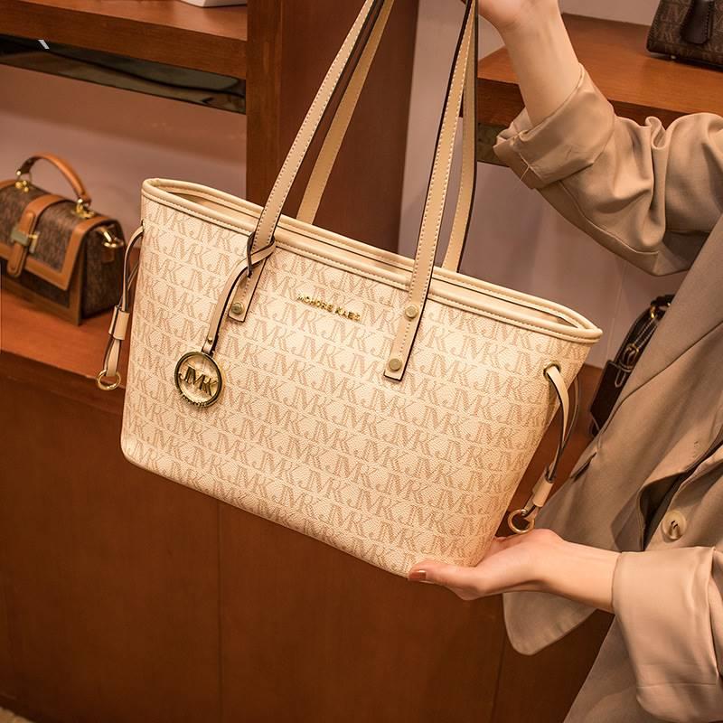 Leather tote bag 2021 New Tide large capacity fashion casual letter Japanese class commuting shoulder