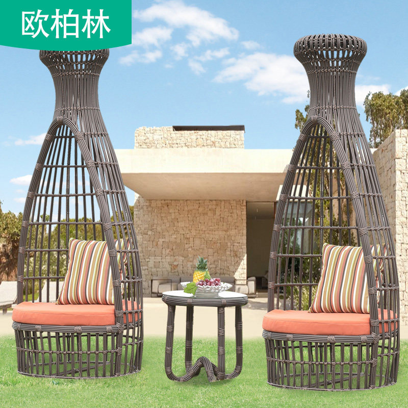 Outdoor leisure table and chair garden creative designer table and chair outdoor courtyard balcony simple rattan chair three-piece combination