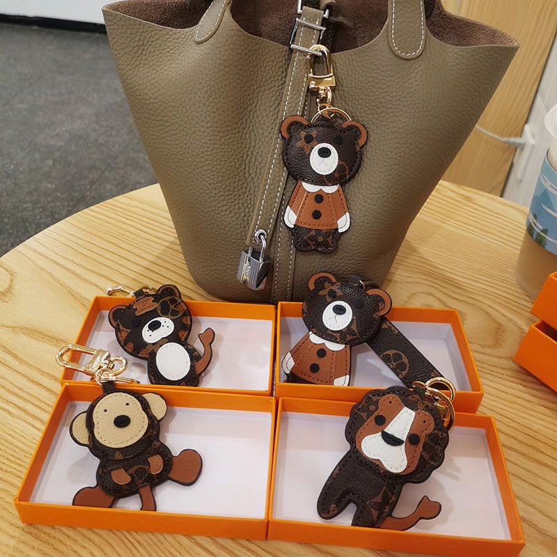 LVGEDETE small tiger car key buckle pendant small lion girl bag hanging decoration small bear key chain old flower