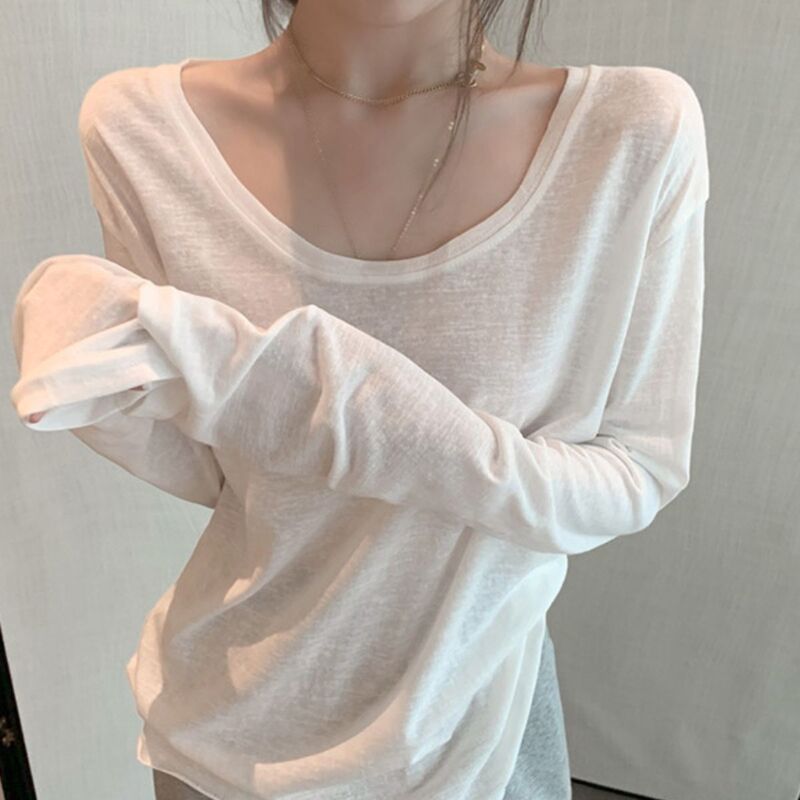 White Long-Sleeved T-Shirt for Women in Autumn and Winter, Loose Casual Inner Wear, Large Neckline, Thin, Slightly See-Through, Stylish Top White Long-Sleeved T-Shirt for Women in Autumn and Winter, Loose Casual Inner Wear, Large Neckline, Thin, Slightly See-Through, Stylish Top