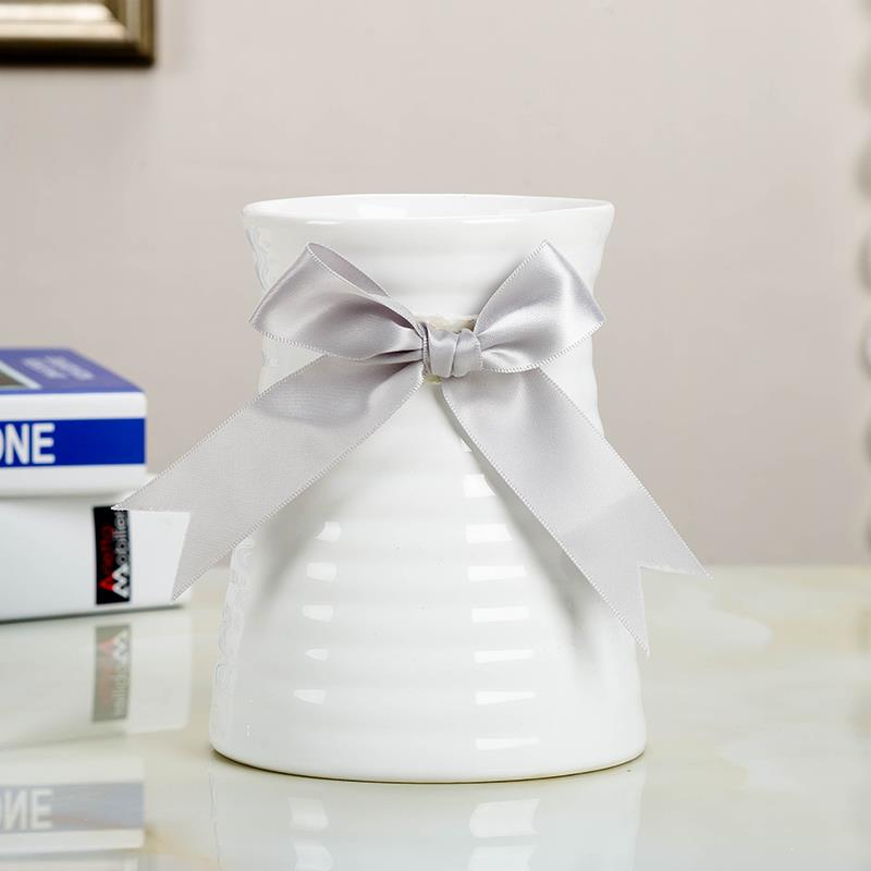 Wide expressions using Wide expressions using plugged into the vase vase short com.lowagie.text.paragraph circular Jane is white decorative flower lily ceramic fine expressions using sitting room