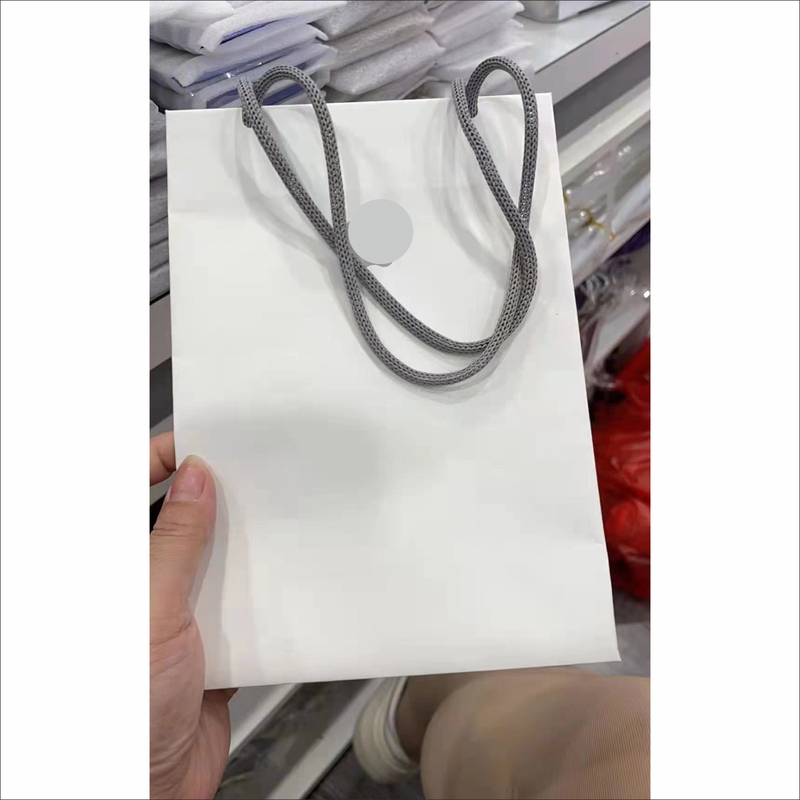 High-End Woven Hollow Paper Rope Direct Sales Store Same Style Eco-Friendly Mobile Phone Gift Paper Bag iPad Custom Tote Shopping Bag
