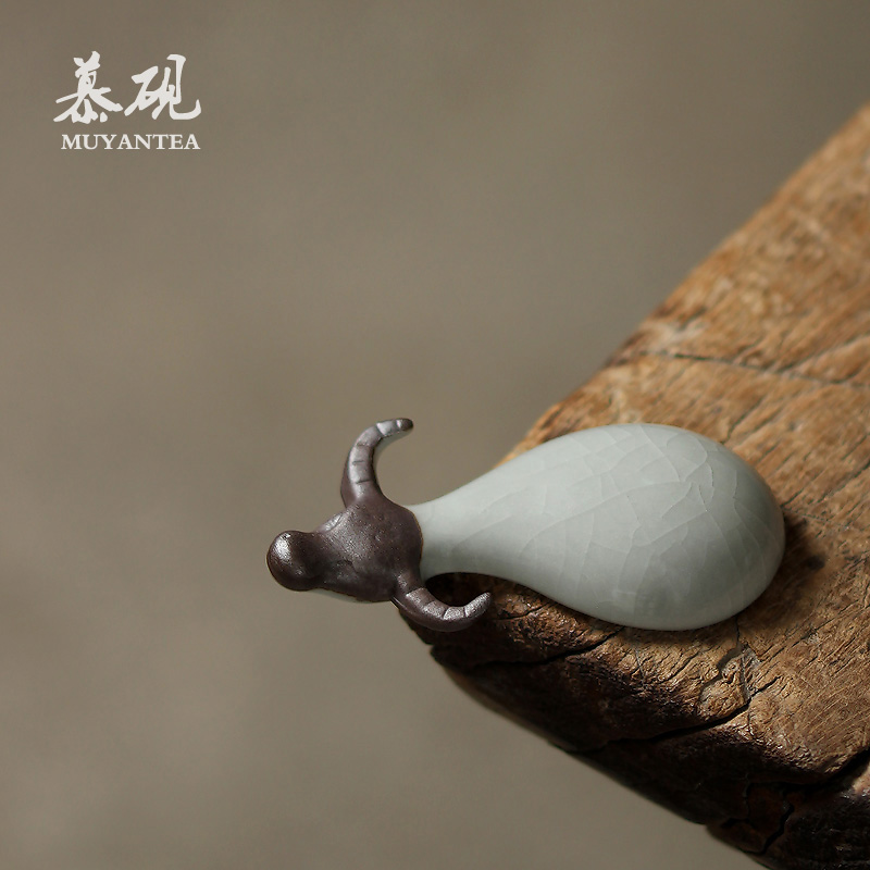 Muyen Jingdezhen hand - made cattle and kun tea pet creative piece can be made to make a tea ceremony spare
