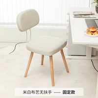 Белая ткань, без подлокотников, ножки из массива дерева, невращающиеся.