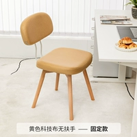 Желтая техническая ткань без подлокотников, ножки из массива дерева, неповоротные.