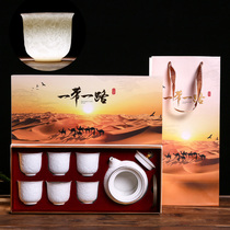 Handmade embossed white jade porcelain gold kung fu tea set set set Jingdezhen lifting beam Teapot Tea Cup home gifts