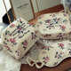 Retro flower makeup bag, small embroidered letters makeup storage bag, three-dimensional trapezoidal body bag