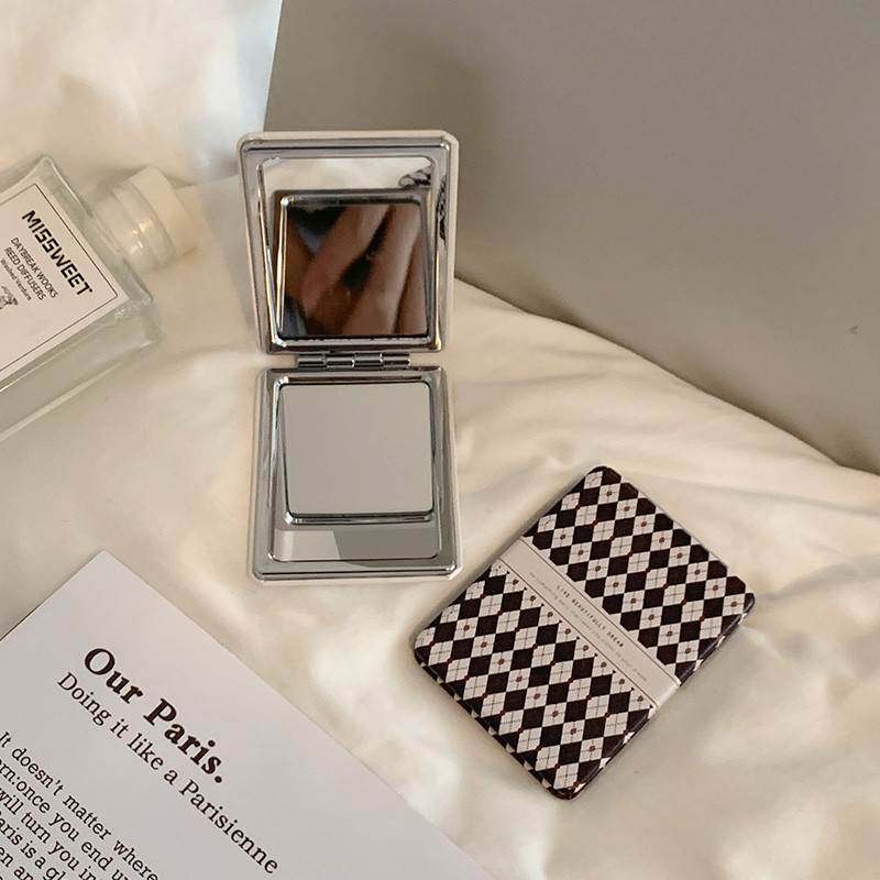 Lovely makeup small mirror with folding overhead double-sided makeup mirror and hand with mini-trumpet