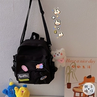 Кремовый розовый слюнявчик