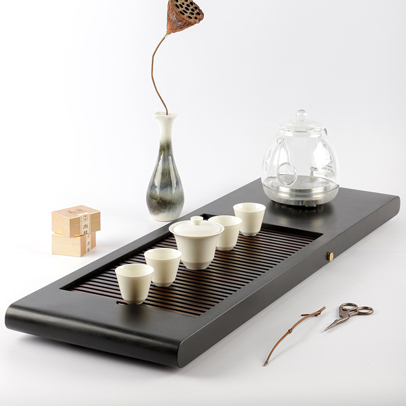 Natural Wujin stone tea tray automatic integrated induction cooker simple household ebony solid wood dry bubble drainage tea table