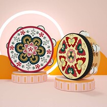 Dunhuang pattern tambourine Xinjiang Uygur tambourine dance examination stage performance children holding props tambourine