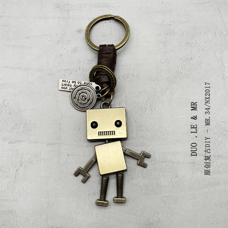 Creative leather car keychain chain link female male personality doll cartoon backpack schoolbag pendant ins tide gifts