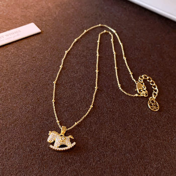 New micro-inlaid golden pony coin pendant necklace for women, light luxury niche temperament sweater chain, high-end accessories