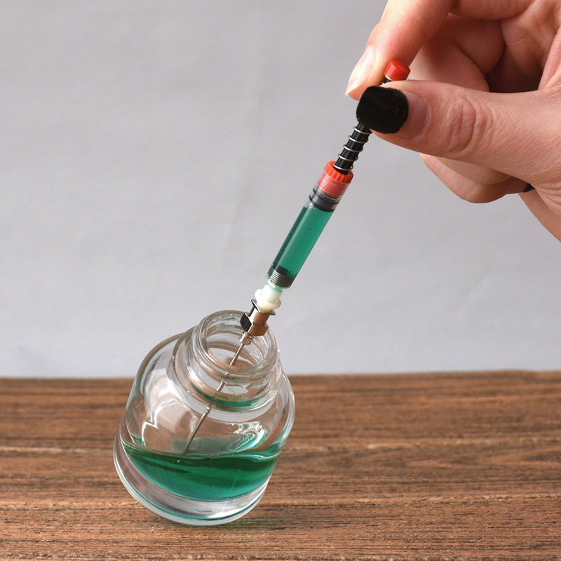 Yuyi YUYI fountain pen ink suction artifact ink on the auxiliary ink absorber can be used for the European standard lamy lamy Baile platinum writing music pen pull and rotate universal needle can absorb the remaining ink