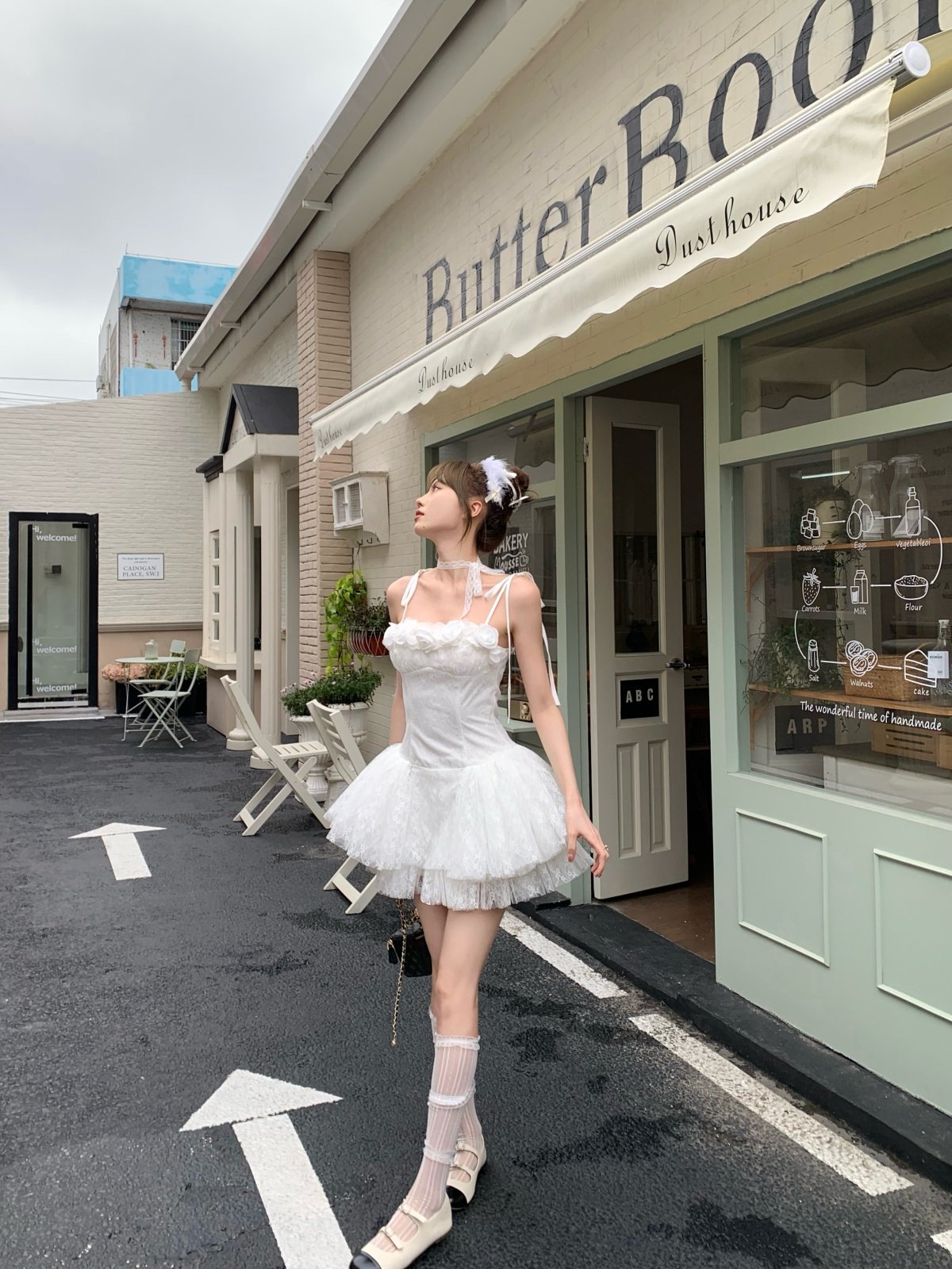 Musefish, a Korean-Chinese brand, presents a pure white lace tulle fairy dress inspired by the Swan Lake ballet style, featuring a sleek and alluring halter top.