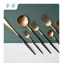 The daylight line across the trees in the former daylight forest ins Western food knife and fork spoon golden dessert fork spoon