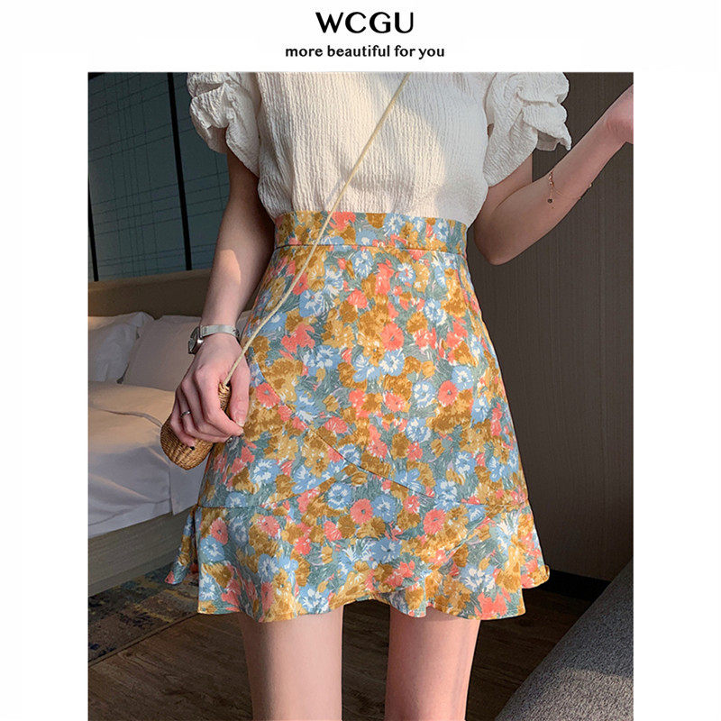 Oil painting short fish tail skirt high waist hip skirt women's 2021 summer new little daisy flower a short skirt