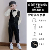 Черный жилет, штаны, орган, рубашка, галстук-бабочка, брошь