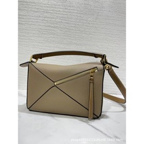 Xi Mengyaos same puzzle geometric bag classic versatile 24cm pillow womens bag hand-held cross-body