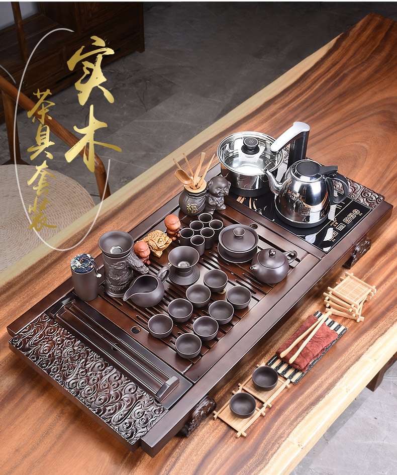 A complete set of violet arenaceous kung fu tea set the teapot tea cups sea household electrical appliances tea accessories solid wood tea tray