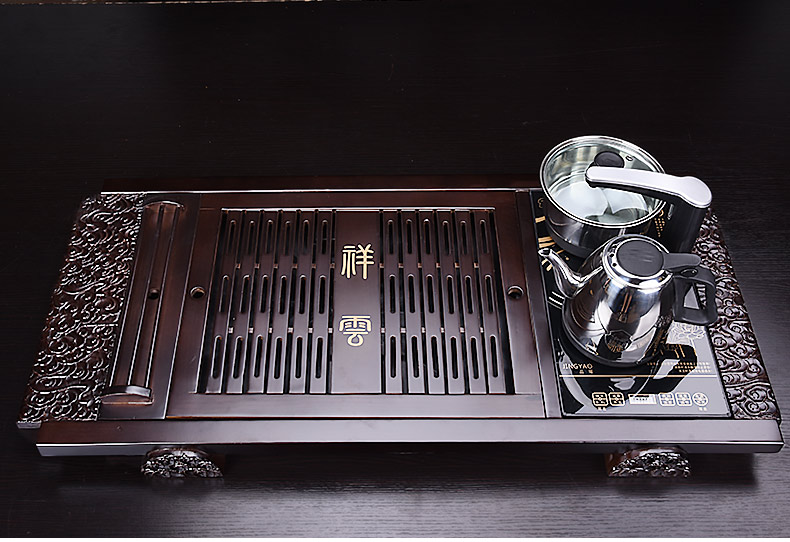 A complete set of violet arenaceous kung fu tea set the teapot tea cups sea household electrical appliances tea accessories solid wood tea tray