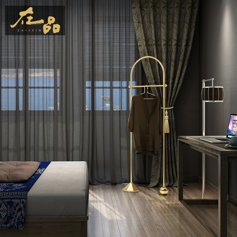 In the pint bedroom floor hanging clothes hanger hanging clothes rack floor clothes rack hanging clothes hanger floor room small hanger