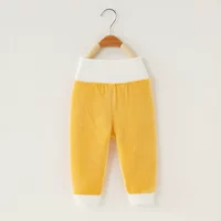 Желтые цветные штаны, высокая талия