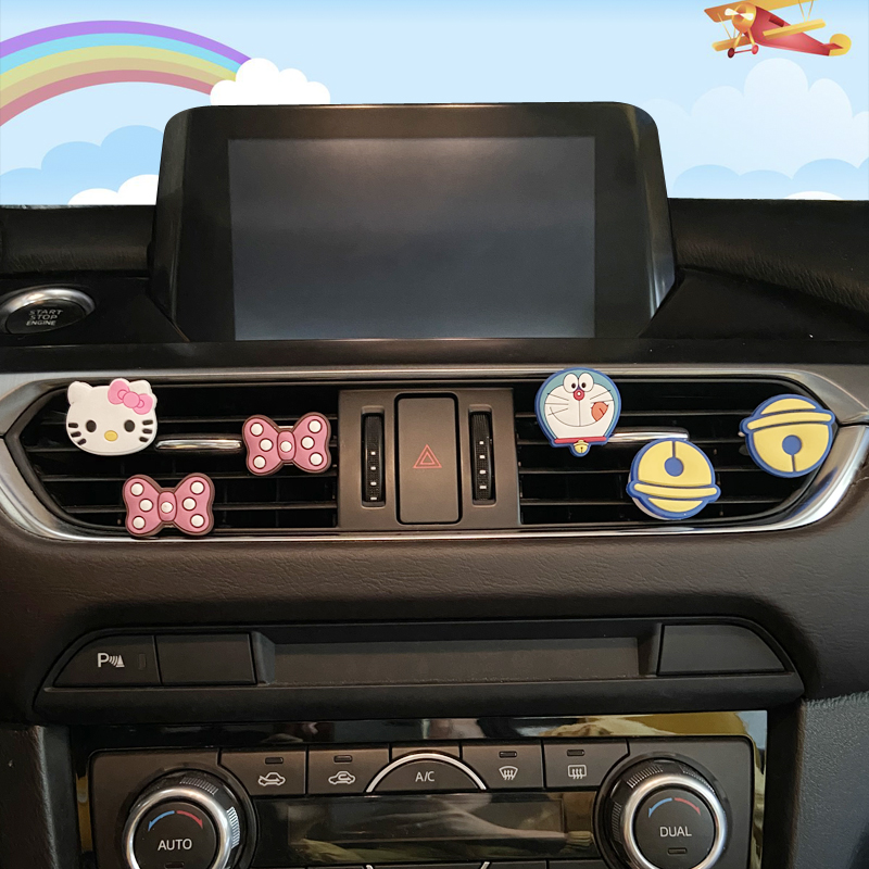 Car air outlet decoration female floret ornaments perfume girl cute cartoon creative perfume clip car accessories