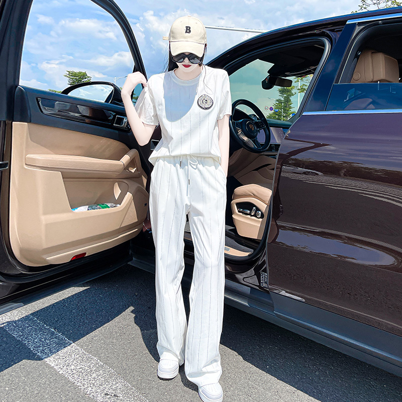 European high - end sports suit female summer 2023 new gas hot drilling and lean casual broad leg pants two pieces