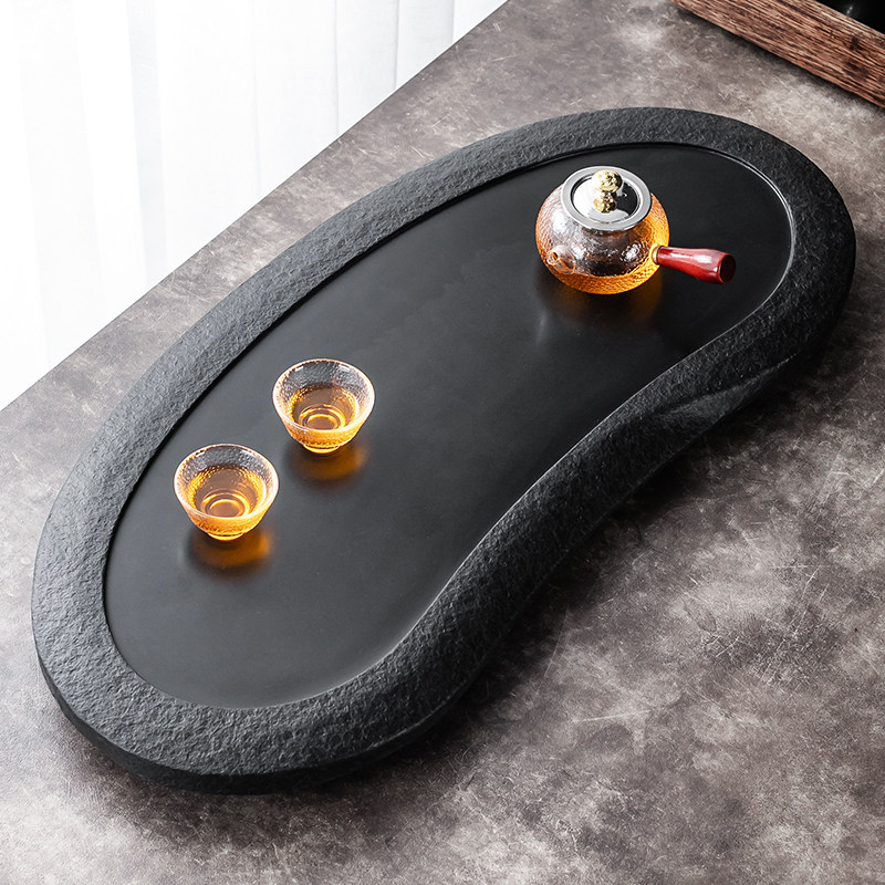 Whole round natural black gold stone tea tray home office simple Chinese drainage large stone tea table Tea Sea
