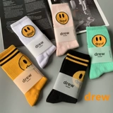 Европейские и американские улицы, занимающиеся японским странным смайливым лицом хлопчатобумажного носки для теленка, вдохновляющие