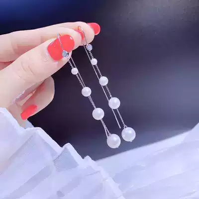 Pearl earrings female 2020 New Tide long version tassel earrings show face thin Korean temperament Net red earrings ear refining
