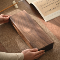A storage box made of two solid pieces of black walnut wood with a lid and a solid wood vintage style miscellaneous brush storage box