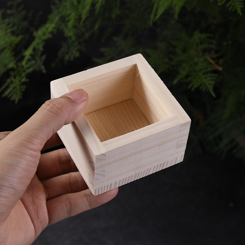 Sashimi plate decoration sake wooden box small wooden cup wooden mason Japanese cuisine salmon dish seafood posture decoration