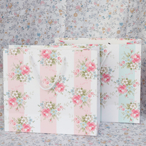 Striped rose gift bag hand paper bag back blue and white rose a bag of two-color eco-friendly paper bag packaging bag