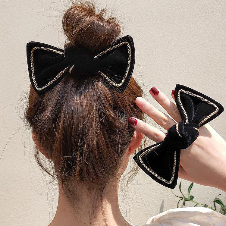 Net red black leather case bow head rope female simple temperament large intestine hair ring tied hair artifact leather band hair rope