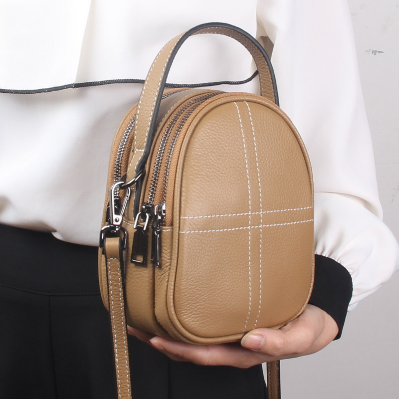 Mobile phone bag women's messenger 2022 new trendy vertical small shoulder bag women's portable trendy soft leather multi-layer mini small bag women