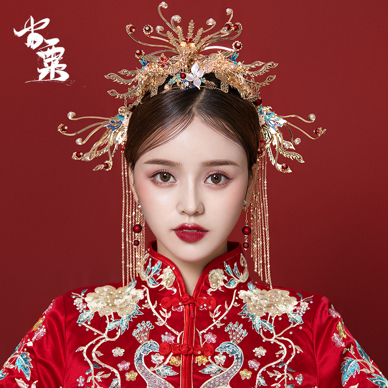 2021 new Chinese style Xiuhe costume headdress step shake phoenix crown bride atmospheric step shake simple golden wedding costume woman