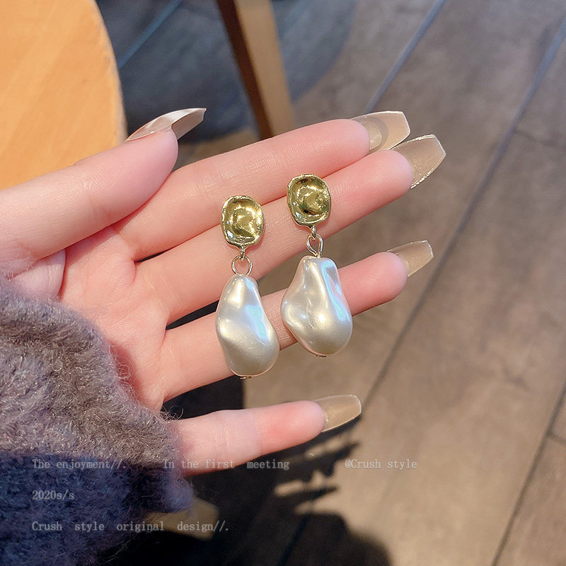 (Lime acc) Small Irregular Pearl Earrings Showing Face